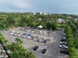 Miri Catholics celebrate open-air mass in parked cars in first Sunday Mass in three months