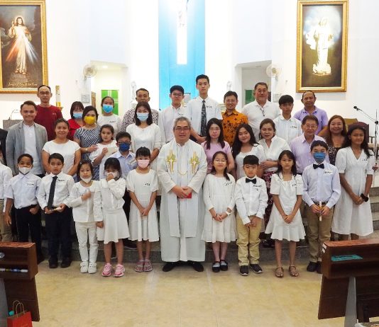 Sunday School students receive Baptism and Rite of Reception