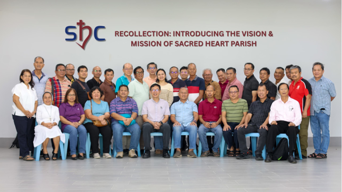 Sacred Heart Parish Pastoral Council and St Mark Church Committee with Fr Felix Au (seated 5th left). Photo- Arthur Ray