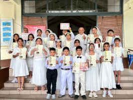 20 receive First Holy Communion