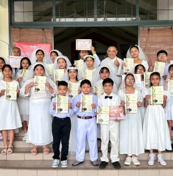 20 receive First Holy Communion