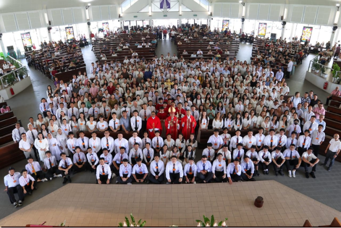 Group photo after Mass with His Grace Archbishop Simon, Rev Fr Paul Hu, Rev Fr Aloysius Dirgahayu.