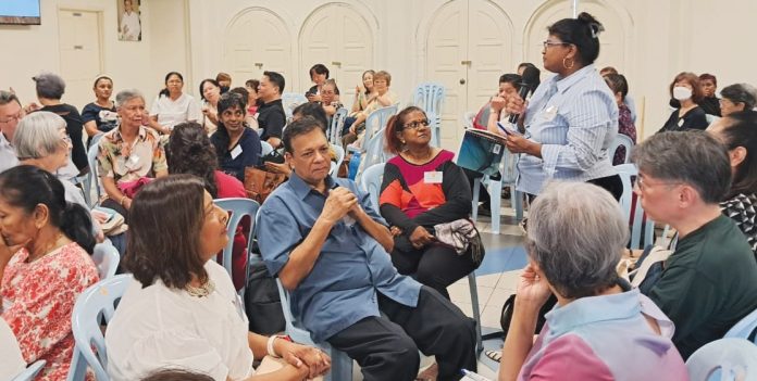 A participant presenting her group’s insights during one of the sessions